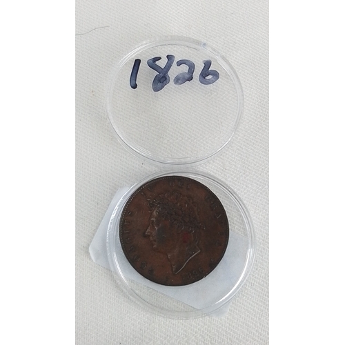 219 - An 1826 George IV copper penny, obverse with laureate head and legend, in a plastic capsule.
