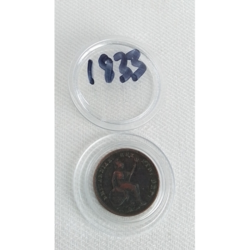 221 - A Victorian copper penny, dated 1833, in a clear plastic coin capsule; obverse with head of Queen Vi... 