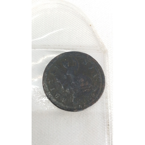 223 - One early 19th century copper coin, the obverse with laureate bust in profile and surrounding legend... 