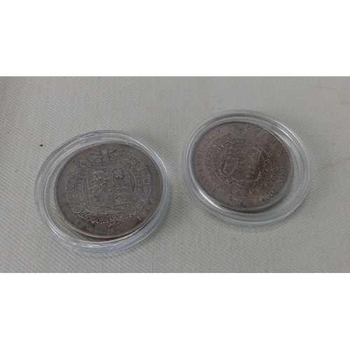 230 - Two silver crown coins, both featuring laureate busts of King George III and gartered shields with s... 