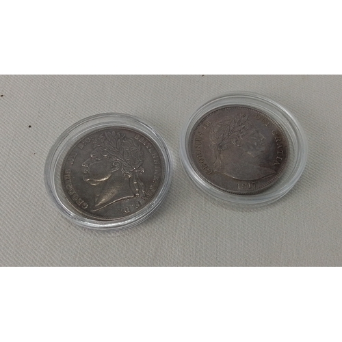 230 - Two silver crown coins, both featuring laureate busts of King George III and gartered shields with s... 