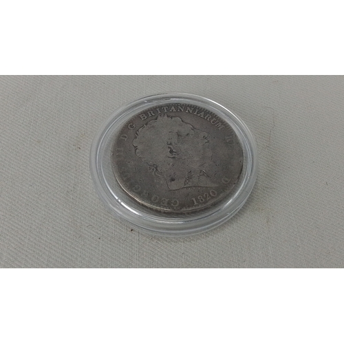 234 - A George III silver crown coin, 1820, laureate bust with Latin legend; reverse with St George slayin... 