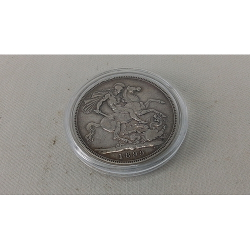 250 - One Victorian silver crown coin, dated 1899, obverse with veiled head portrait of Queen Victoria and... 