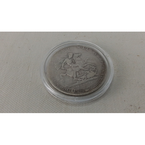 261 - One 1820 British silver crown coin, obverse with laureate bust of King George IV inscribed “GEORGIUS... 