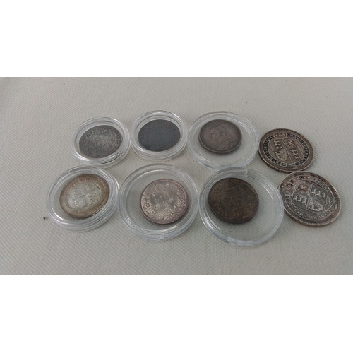 273 - Set of 8 Victorian British silver coins, including florins and one-halfpenny pieces, showing Queen V... 