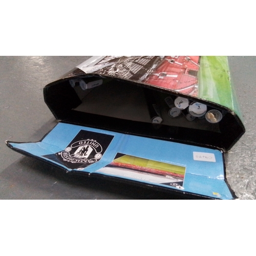 299 - Collection of Manchester United football club posters, rolled, featuring Old Trafford stadium imager... 