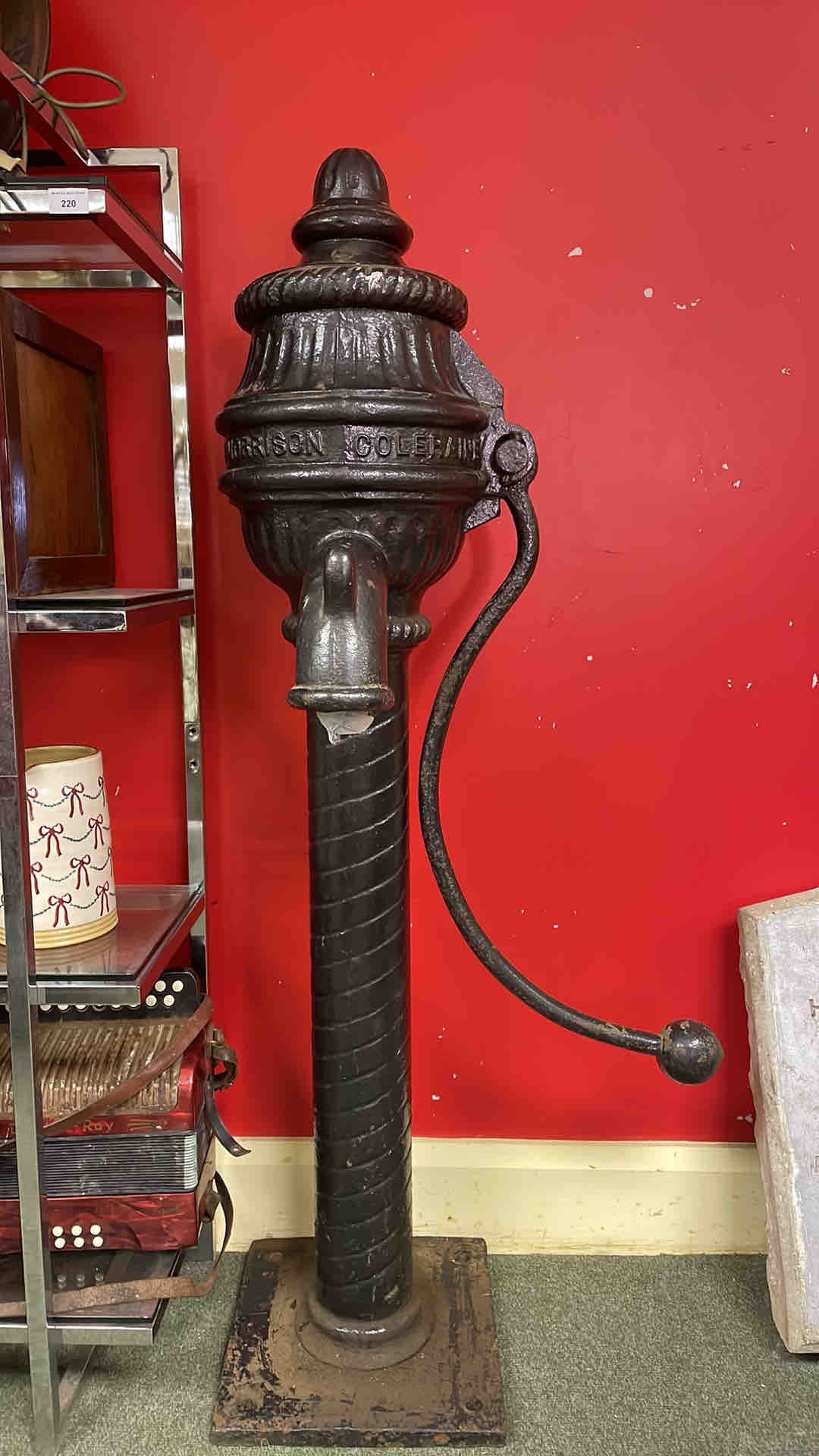A Victorian cast-iron street hydrant or standpipe, with arched spout ...