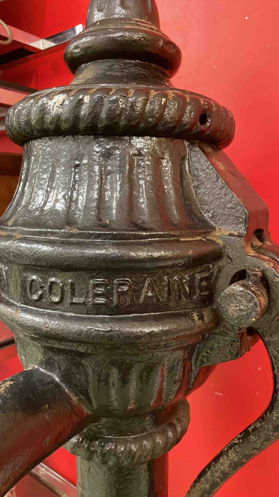 A Victorian cast-iron street hydrant or standpipe, with arched spout ...