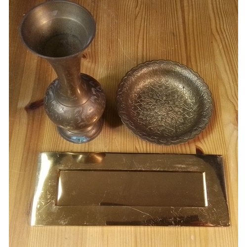 555 - Group of 3 brassware items, comprising an engraved trumpet-form vase, a chased shallow dish with sca... 