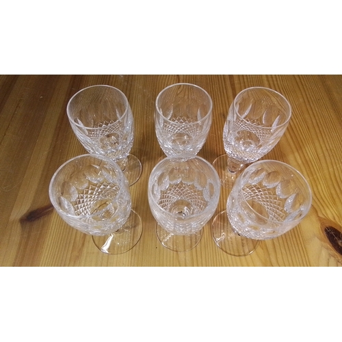 562 - Set of 6 Waterford Crystal goblets, each with flared bowl engraved with leaf motifs above diamond-cu... 