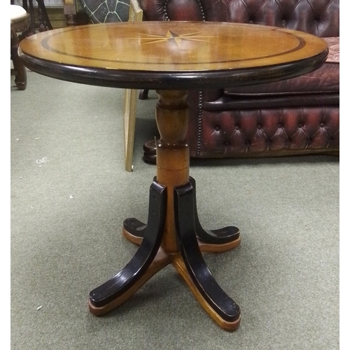 572 - A circular pedestal occasional table, the top inlaid with a compass-rose star and ebonised line bord... 