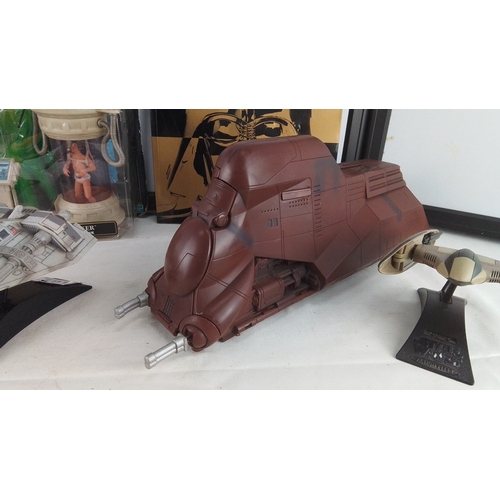 403 - A group of Star Wars collectibles, including boxed Hasbro figures, a Luke Skywalker in Echo Base Bac... 