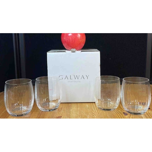612 - A set of Galway Irish Crystal tumbler glasses, each of rounded form with vertical optic ribs and hea... 