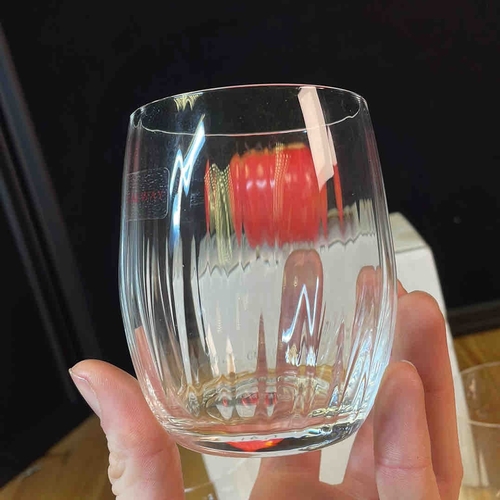 612 - A set of Galway Irish Crystal tumbler glasses, each of rounded form with vertical optic ribs and hea... 