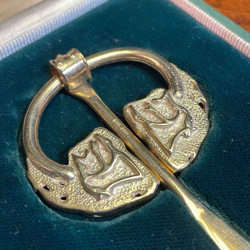 A Studio Twentyfive 9ct gold reproduction of the “Dalriada” Ulster penannular brooch, with ring and pin and cast zoomorphic terminals, in a fitted presentation case, with printed leaflet. Total weight 47g.