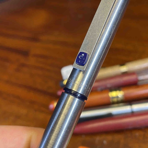 A group of vintage fountain pens and ballpoint pens, including Parker ...