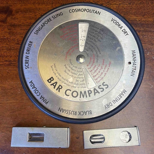 A group of novelty barware comprising a stainless steel “Bar Compass ...
