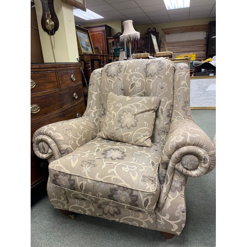582 - A two seater button back sofa and matching armchair.