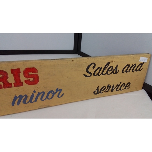 Hand-painted wooden advertising sign—inscribed “Founded 1948 MORRIS ...
