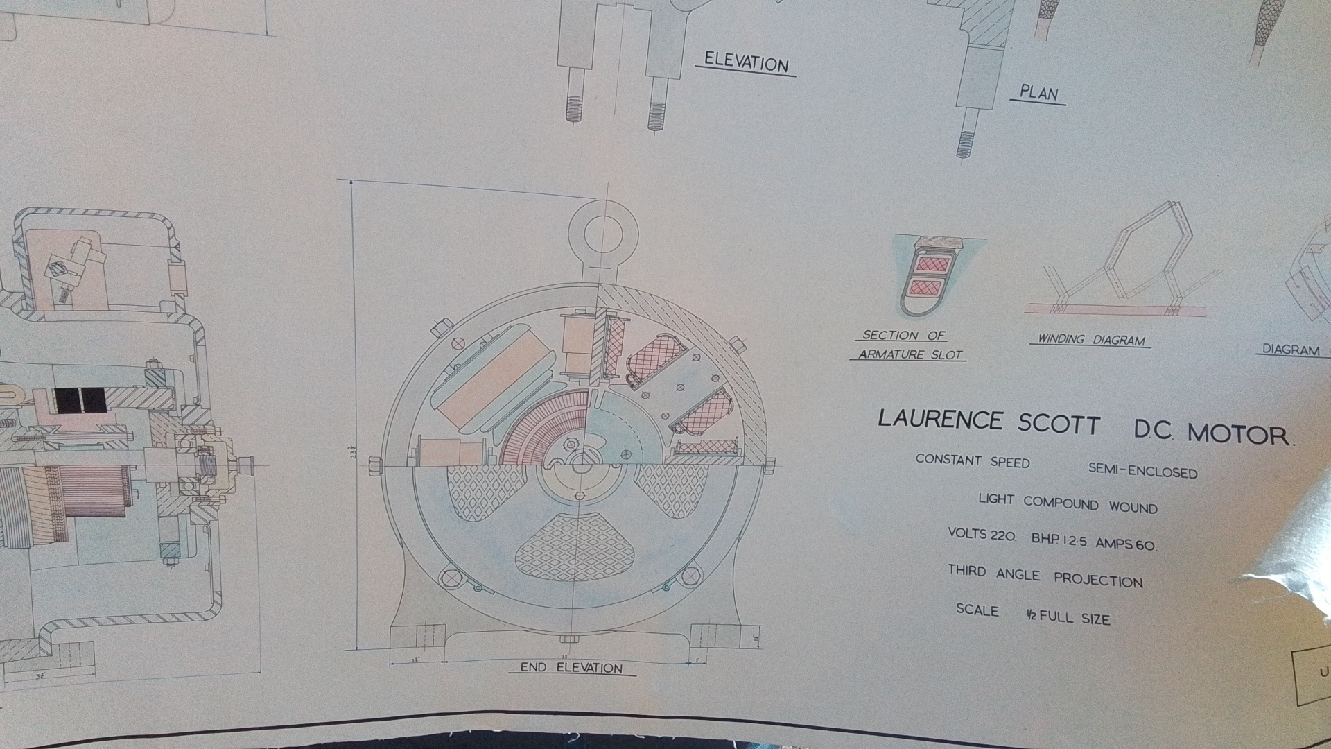 Pair of rolled engineering drawings on paper—technical plan, elevation ...