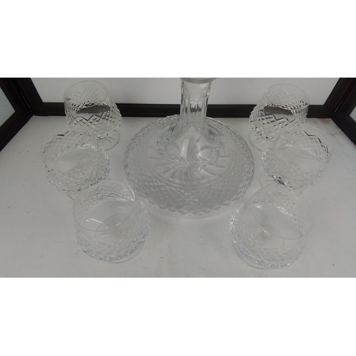 100 - A Galway crystal ships decanter and a set of six Tyrone crystal brandy glasses.