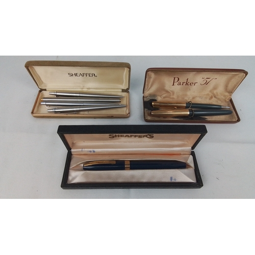 63 - A group of Sheaffer and Parker writing instruments, including a brushed metal Sheaffer trio in fitte... 