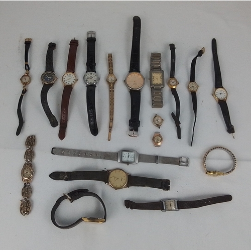 65 - A group of assorted wristwatches, including gold-tone and stainless-steel cases, leather straps, and... 