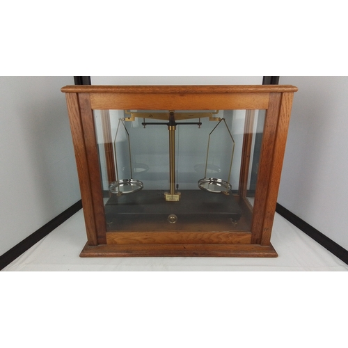 71 - Griffin & George ‘Microid Duorider’ laboratory balance, housed in a glazed oak case; the instrument ... 