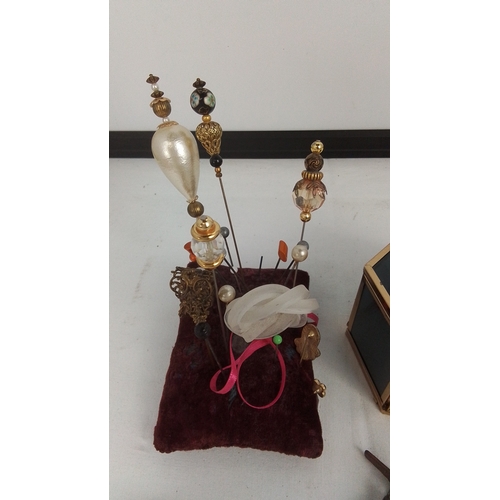 77 - A quantity of costume jewellery and small accessories, including enamel and paste-set brooches, tie ... 