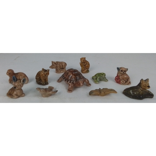 80 - A group of glazed porcelain animal miniatures, including a turtle, fawn, fox, squirrel, pig, frog an... 