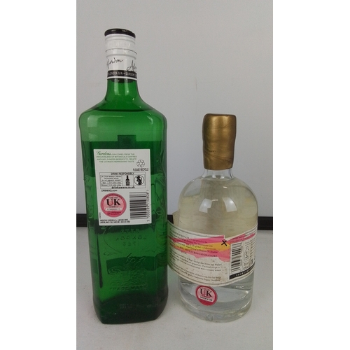 88 - Two bottles of gin comprising Gordon’s Special Dry London Gin in a green glass bottle with moulded d... 