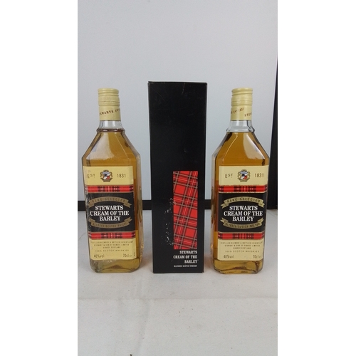 89 - A group of Stewarts ‘Cream of the Barley’ blended Scotch whisky, 70cl, 40% vol—two bottles with a pr... 