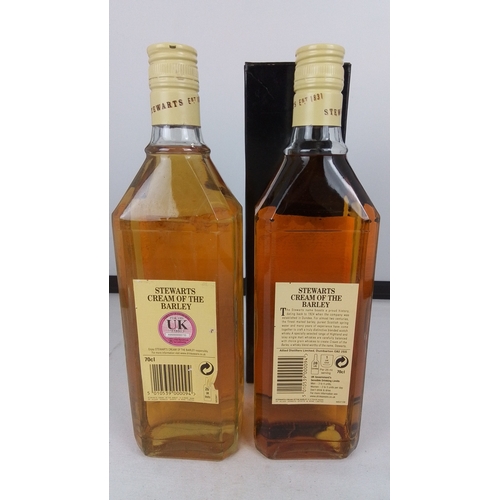 89 - A group of Stewarts ‘Cream of the Barley’ blended Scotch whisky, 70cl, 40% vol—two bottles with a pr... 