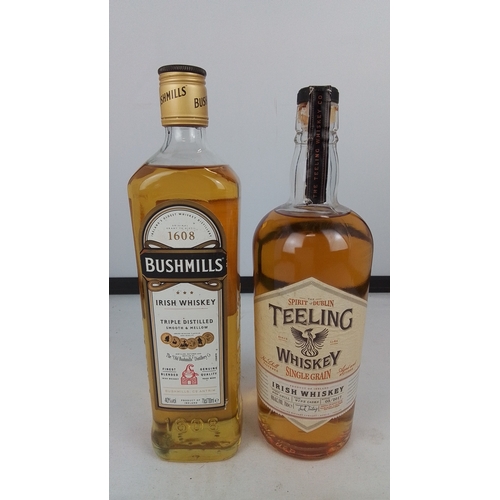 90 - A pair of Irish whiskey bottles comprising Bushmills Original triple distilled, 40% vol, 70cl, and T... 