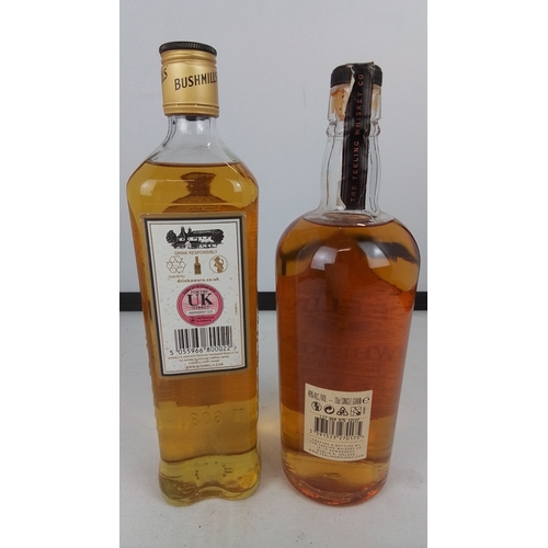 90 - A pair of Irish whiskey bottles comprising Bushmills Original triple distilled, 40% vol, 70cl, and T... 