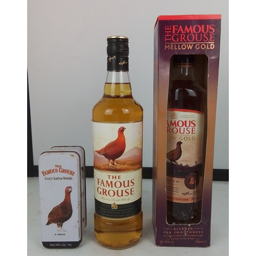 93 - A group of The Famous Grouse Scotch whisky comprising a 700ml bottle of The Famous Grouse Mellow Gol... 