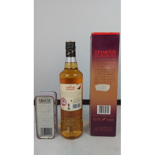 93 - A group of The Famous Grouse Scotch whisky comprising a 700ml bottle of The Famous Grouse Mellow Gol... 