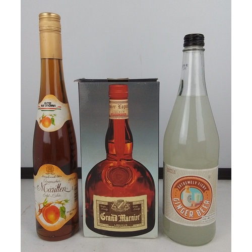 94 - A group of three bottles comprising Grand Marnier Cordon Rouge liqueur in presentation box, Gutes au... 