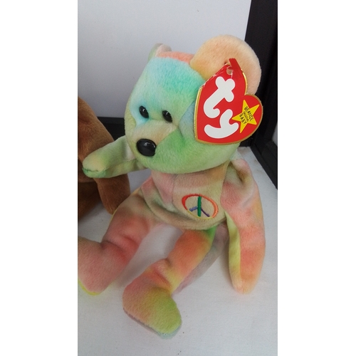 97 - A group of Ty plush toys, including a Beanie Babies Collection chick in eggshell, a pastel teddy bea... 