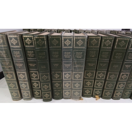 113 - A suite of Charles Dickens ‘Complete Works’ volumes—green cloth bindings with gilt-tooled spines and... 