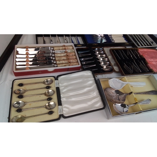 116 - A group of assorted cased flatware including fish knives and forks with ivory-coloured handles, moth... 