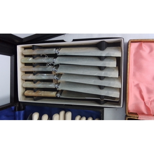 116 - A group of assorted cased flatware including fish knives and forks with ivory-coloured handles, moth... 