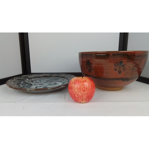 118 - A studio pottery Winchcombe stoneware bowl with iron-red glaze and abstract foliate motifs, together... 