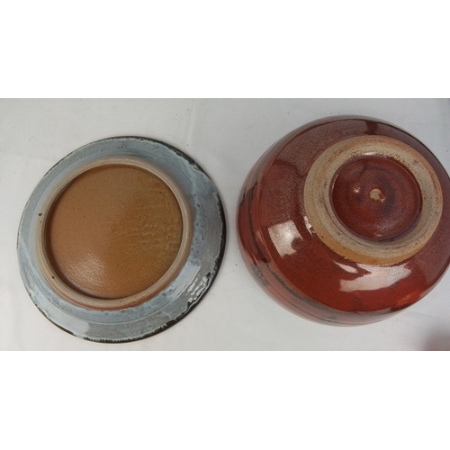 118 - A studio pottery Winchcombe stoneware bowl with iron-red glaze and abstract foliate motifs, together... 