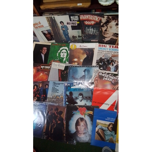 A collection of popular music LP records and sleeves, various artists ...