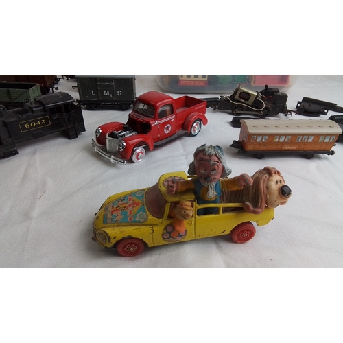 485 - A quantity of vintage toy vehicles and model railway rolling stock, including LMS goods wagons, a bl... 