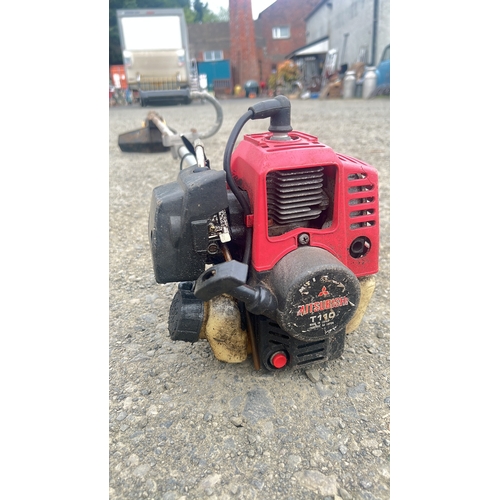 129 - A brushcutter with Marunkaka T140 petrol engine.