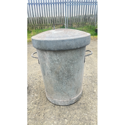 131 - A vintage galvanised metal poultry feeder, embossed 