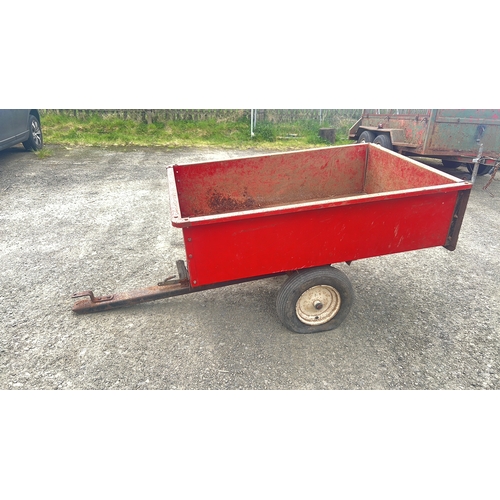 137 - An Agri-Fab 10 cu. ft. steel utility dump cart, red painted, with rectangular open tub, pin-hitch dr... 