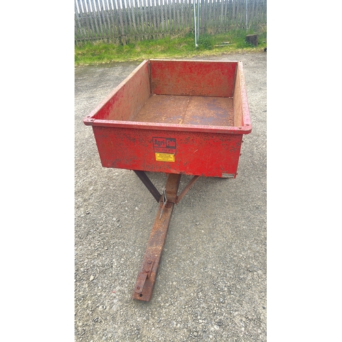 137 - An Agri-Fab 10 cu. ft. steel utility dump cart, red painted, with rectangular open tub, pin-hitch dr... 